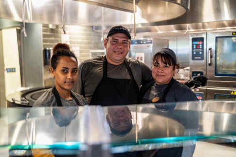 Photo of three food service workers